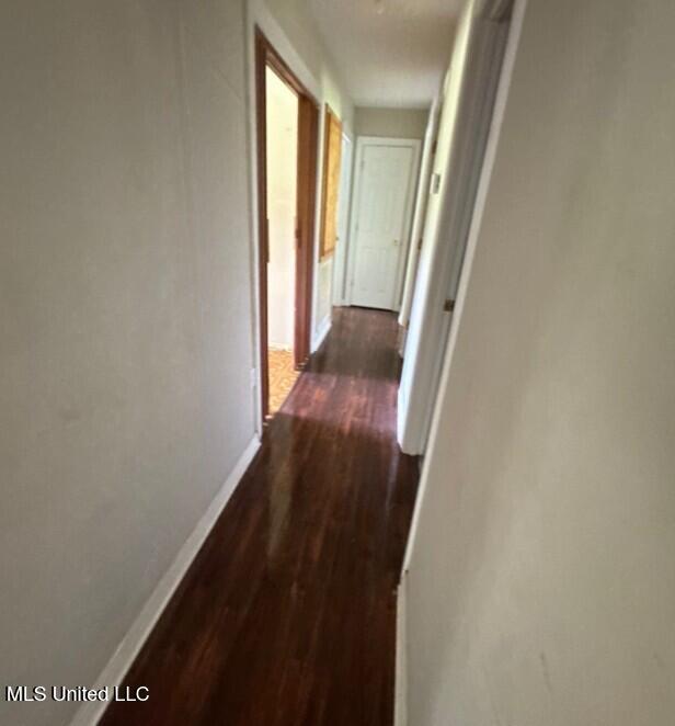 5 Union Church Rd, Tylertown, MS 39667 - corridor featuring baseboards and dark wood-style floors