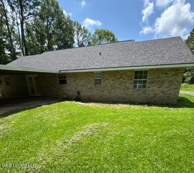 5 Union Church Rd, Tylertown, MS 39667 - back of house featuring a lawn, french doors, and roof with shingles