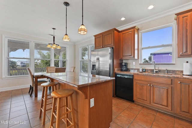 kitchen featuring stainless steel fridge with ice dispenser, a center island, dishwasher, hanging light fixtures, and sink