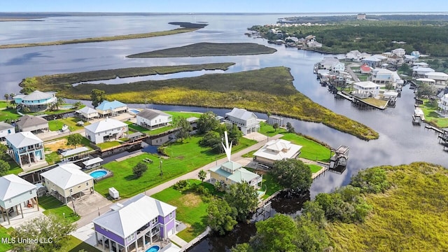 bird's eye view with a water view