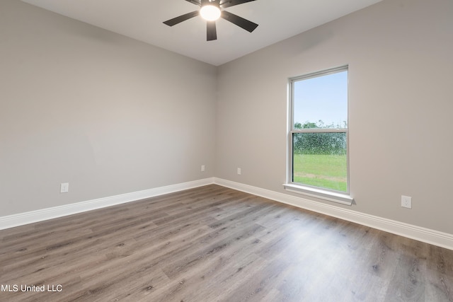 unfurnished room featuring ceiling fan and light hardwood / wood-style floors