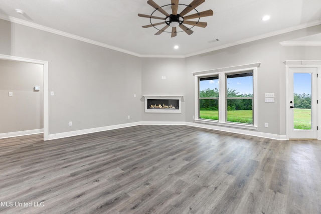 unfurnished living room with wood-type flooring, ceiling fan, and ornamental molding