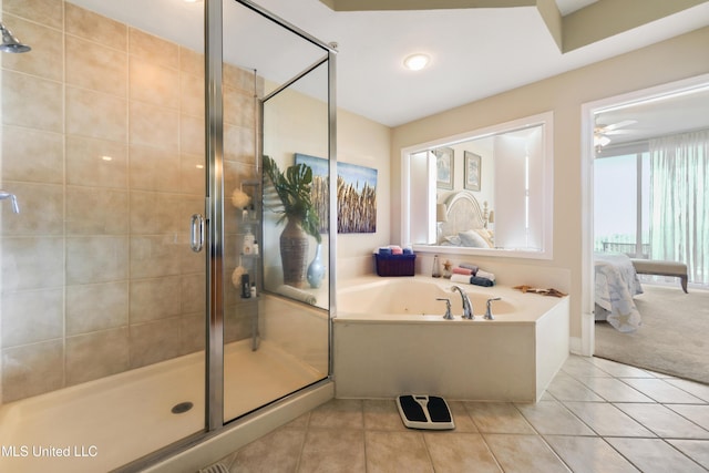 2668 Beach Blvd Unit 304, Biloxi, MS 39531 - full bathroom with connected bathroom, a shower stall, tile patterned floors, and a tub with jets