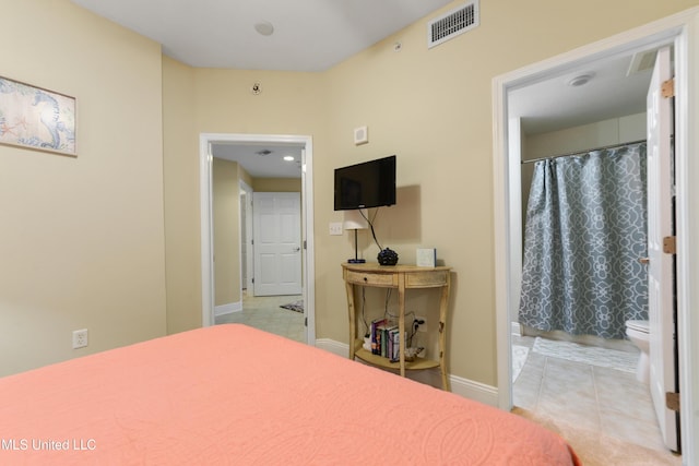 2668 Beach Blvd Unit 304, Biloxi, MS 39531 - bedroom featuring tile patterned flooring and baseboards