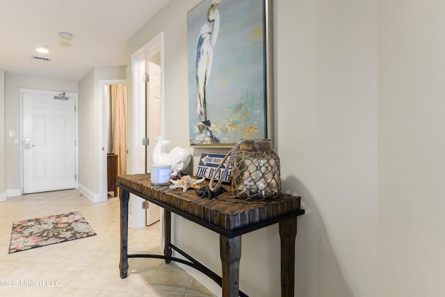 2668 Beach Blvd Unit 304, Biloxi, MS 39531 - hallway with light tile patterned floors, baseboards, and recessed lighting