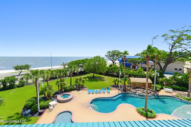 2668 Beach Blvd Unit 304, Biloxi, MS 39531 - community pool with a community hot tub, a water view, a patio area, and a yard