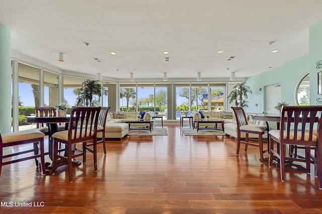 2668 Beach Blvd Unit 304, Biloxi, MS 39531 - dining area featuring healthy amount of natural light, recessed lighting, and wood finished floors