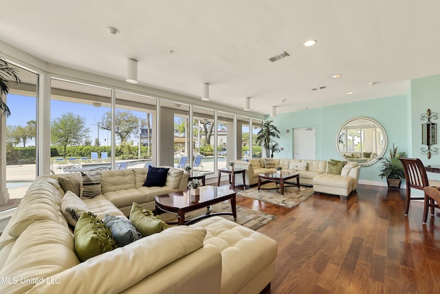 2668 Beach Blvd Unit 304, Biloxi, MS 39531 - living room featuring dark wood-style floors and recessed lighting