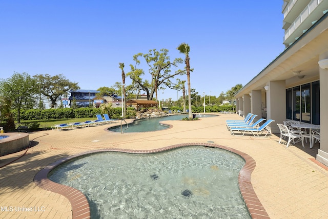 2668 Beach Blvd Unit 304, Biloxi, MS 39531 - community pool with a patio area and a jacuzzi
