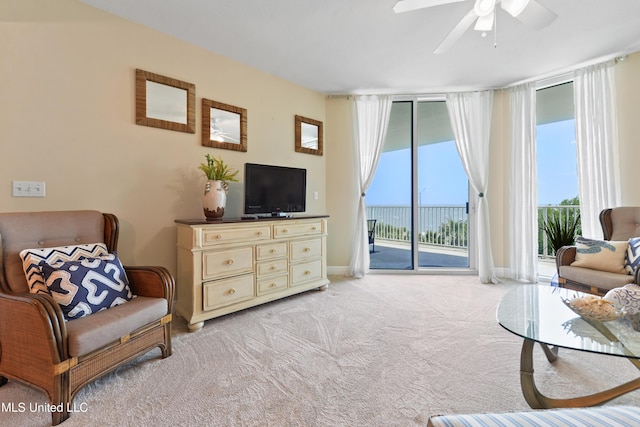 2668 Beach Blvd Unit 304, Biloxi, MS 39531 - living area featuring ceiling fan and carpet flooring