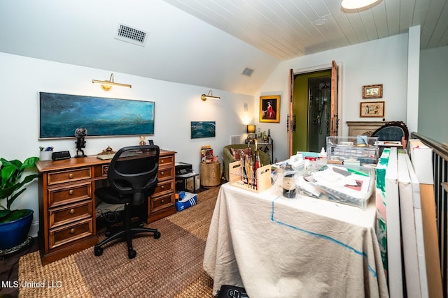 carpeted home office featuring vaulted ceiling and wooden ceiling