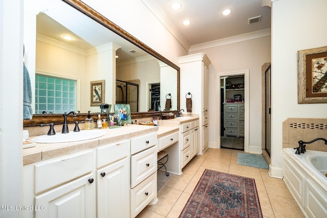 bathroom featuring vanity, plus walk in shower, and tile patterned flooring