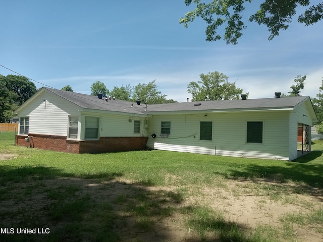 206 Birch Ave, Indianola, MS 38751 - rear view of property with a yard