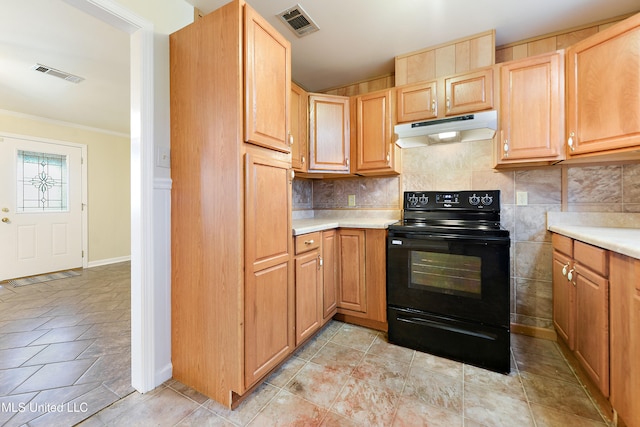 kitchen with decorative backsplash, electric range, crown molding, and light tile patterned flooring