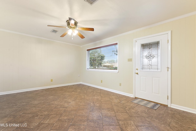 foyer with ceiling fan and ornamental molding