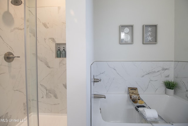 bathroom featuring tile walls and plus walk in shower