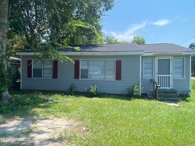 view of front of house with a front yard