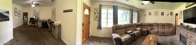 living area with lofted ceiling, carpet flooring, and ceiling fan