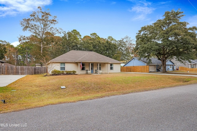 single story home featuring a porch, a front yard, and fence