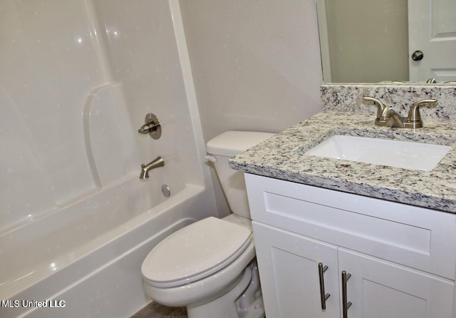 full bathroom featuring toilet, bathtub / shower combination, and vanity