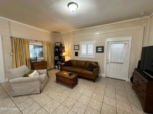 515 Krebs Ave, Pascagoula, MS 39567 - living room with a textured ceiling, ornamental molding, and light tile patterned flooring