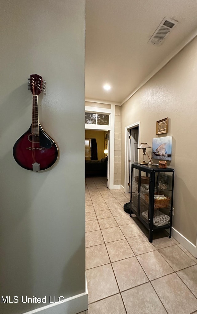 515 Krebs Ave, Pascagoula, MS 39567 - hallway with light tile patterned floors and baseboards