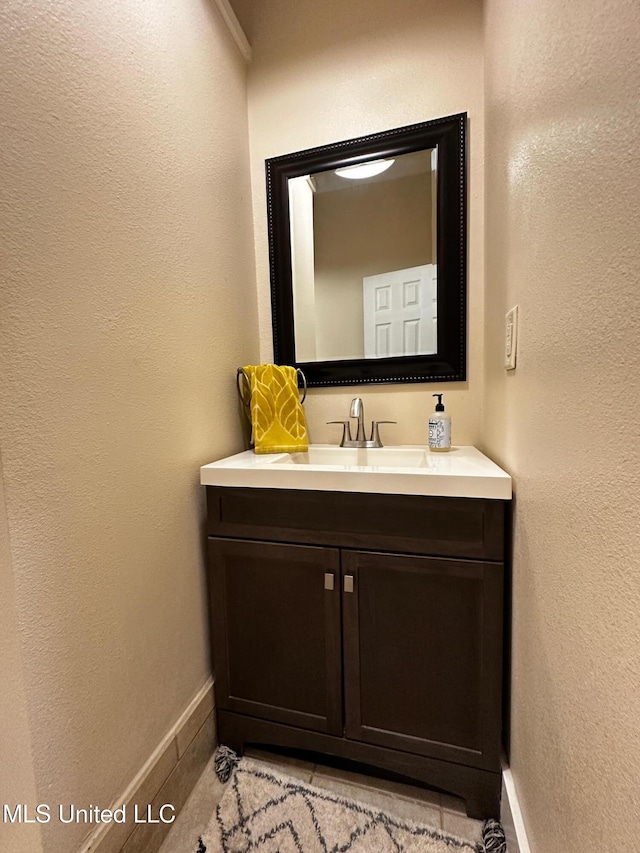 515 Krebs Ave, Pascagoula, MS 39567 - bathroom featuring vanity and a textured wall