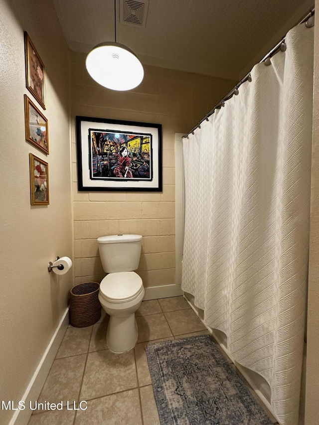 515 Krebs Ave, Pascagoula, MS 39567 - bathroom with tile patterned flooring and curtained shower