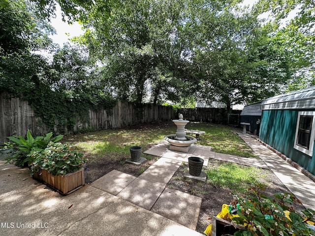 515 Krebs Ave, Pascagoula, MS 39567 - fenced backyard featuring a patio
