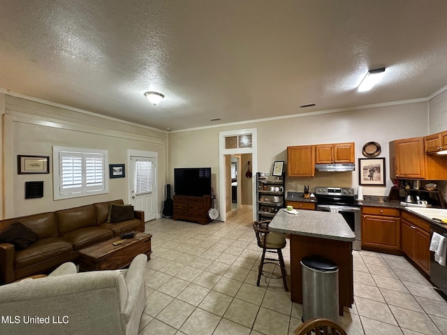 515 Krebs Ave, Pascagoula, MS 39567 - kitchen featuring stainless steel range with electric stovetop, open floor plan, a textured ceiling, light tile patterned floors, and a breakfast bar area