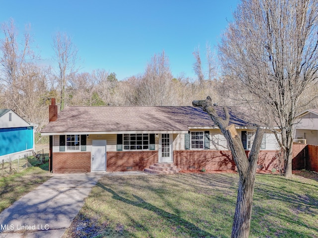 single story home with a front yard