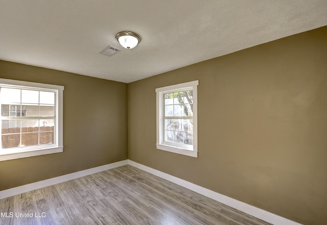 223 Second Ave, Vicksburg, MS 39183 - empty room featuring light wood-type flooring
