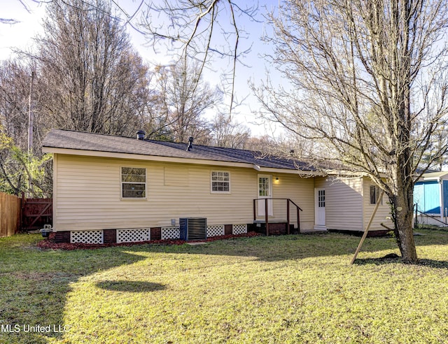 223 Second Ave, Vicksburg, MS 39183 - rear view of property with central AC unit and a lawn