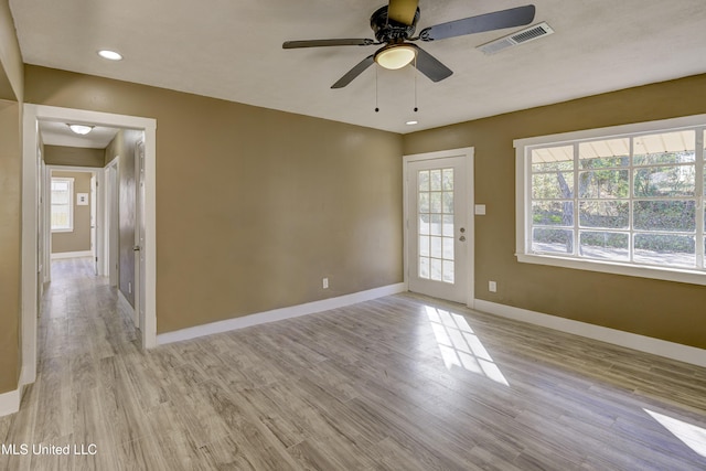 223 Second Ave, Vicksburg, MS 39183 - empty room featuring ceiling fan and light hardwood / wood-style floors