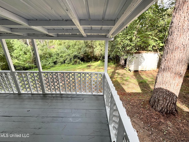 deck with a shed