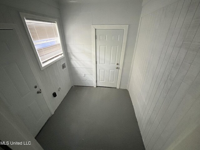 2123 Belvedere Dr, Jackson, MS 39204 - empty room with carpet flooring and wooden walls