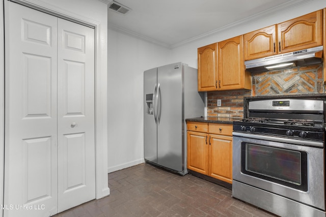 kitchen featuring decorative backsplash, stainless steel appliances, and crown molding