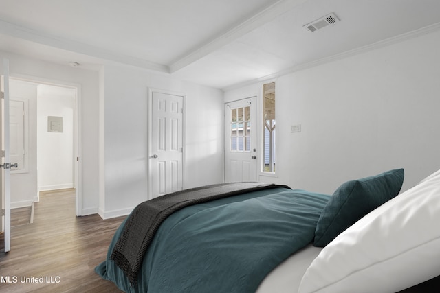 bedroom featuring wood-type flooring