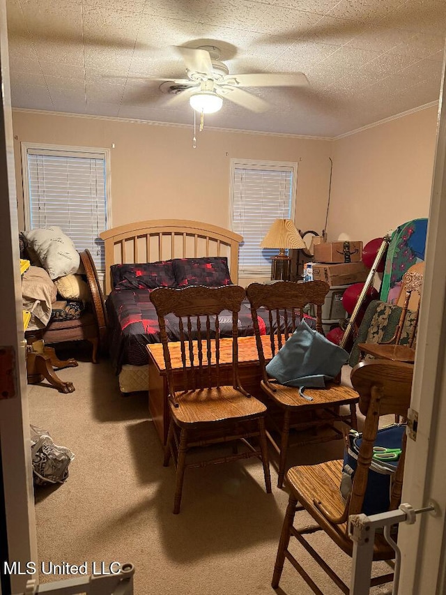 1173 NW Ave, Durant, MS 39063 - carpeted bedroom featuring crown molding and a ceiling fan