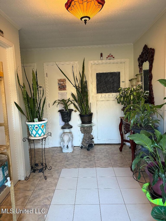 1173 NW Ave, Durant, MS 39063 - hall featuring tile patterned floors and ornamental molding