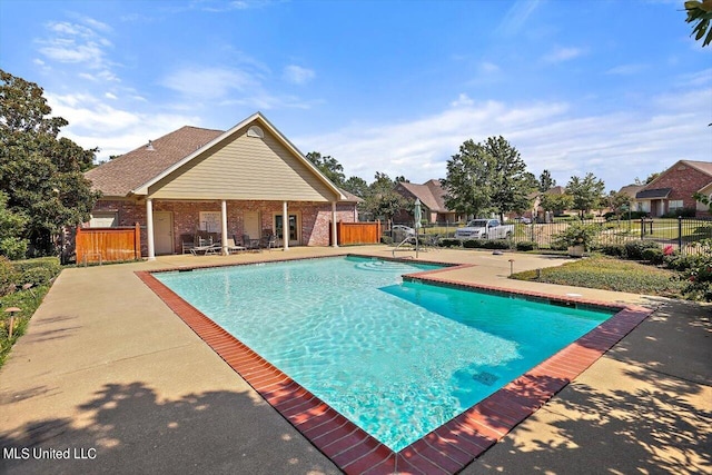 view of pool featuring a patio area