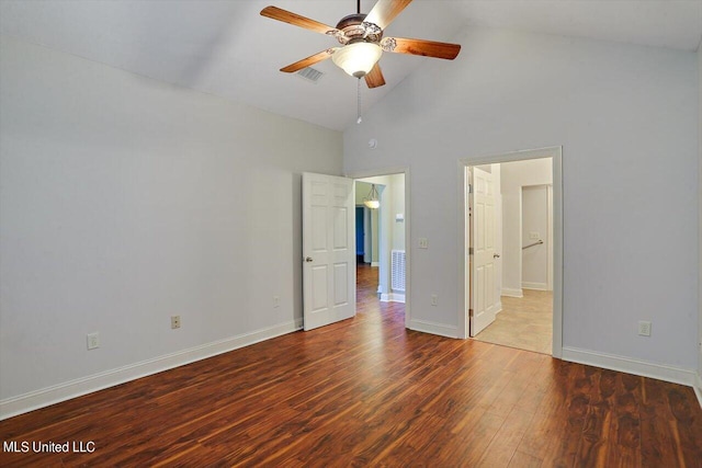 unfurnished bedroom with wood-type flooring, high vaulted ceiling, and ceiling fan