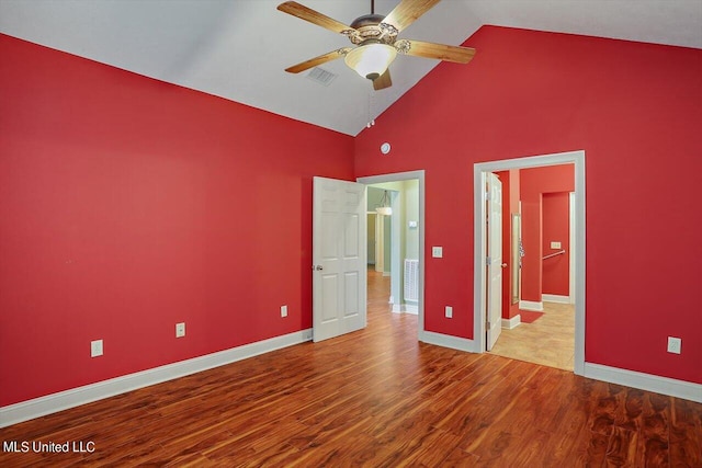 unfurnished bedroom with light hardwood / wood-style flooring, high vaulted ceiling, and ceiling fan