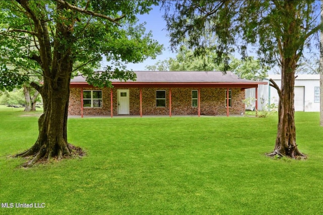 4127 Ceolia Taylor Rd, Moss Point, MS 39562 - view of front facade featuring a front yard and brick siding
