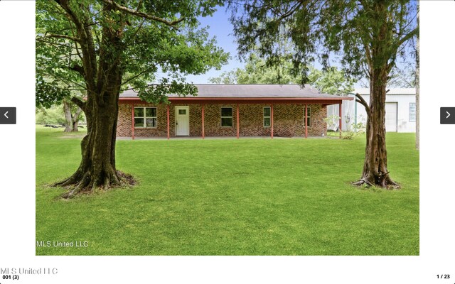4127 Ceolia Taylor Rd, Moss Point, MS 39562 - view of front of home featuring a front lawn