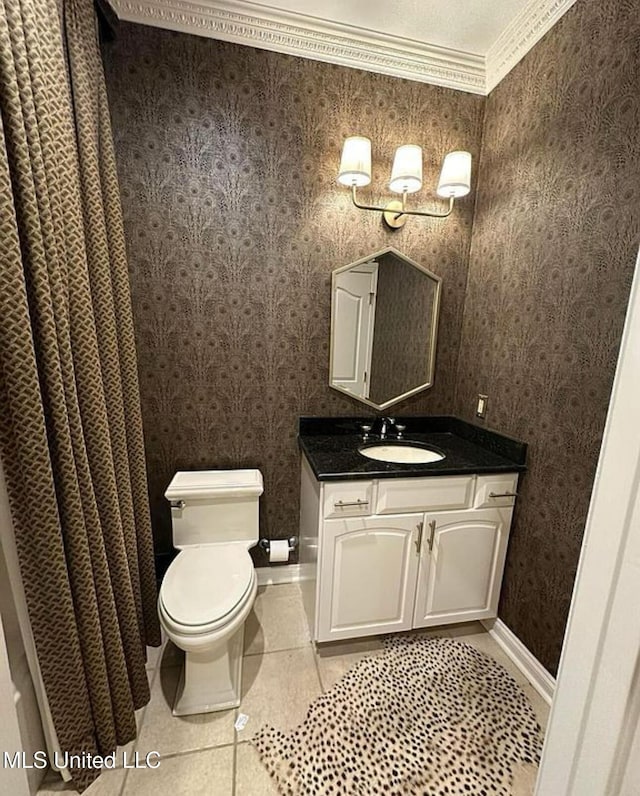 full bathroom with wallpapered walls, tile patterned flooring, toilet, vanity, and crown molding