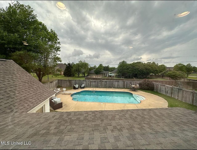 view of pool with a fenced in pool, a patio, and a fenced backyard