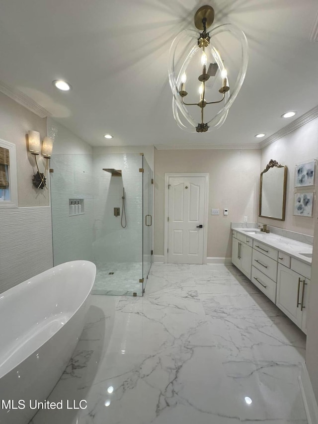 full bathroom with a sink, double vanity, a freestanding bath, a shower stall, and ornamental molding