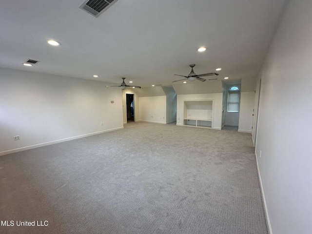unfurnished living room with baseboards, a ceiling fan, visible vents, and recessed lighting