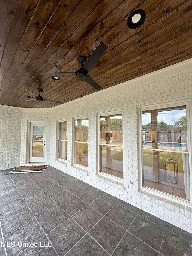 view of patio featuring a ceiling fan
